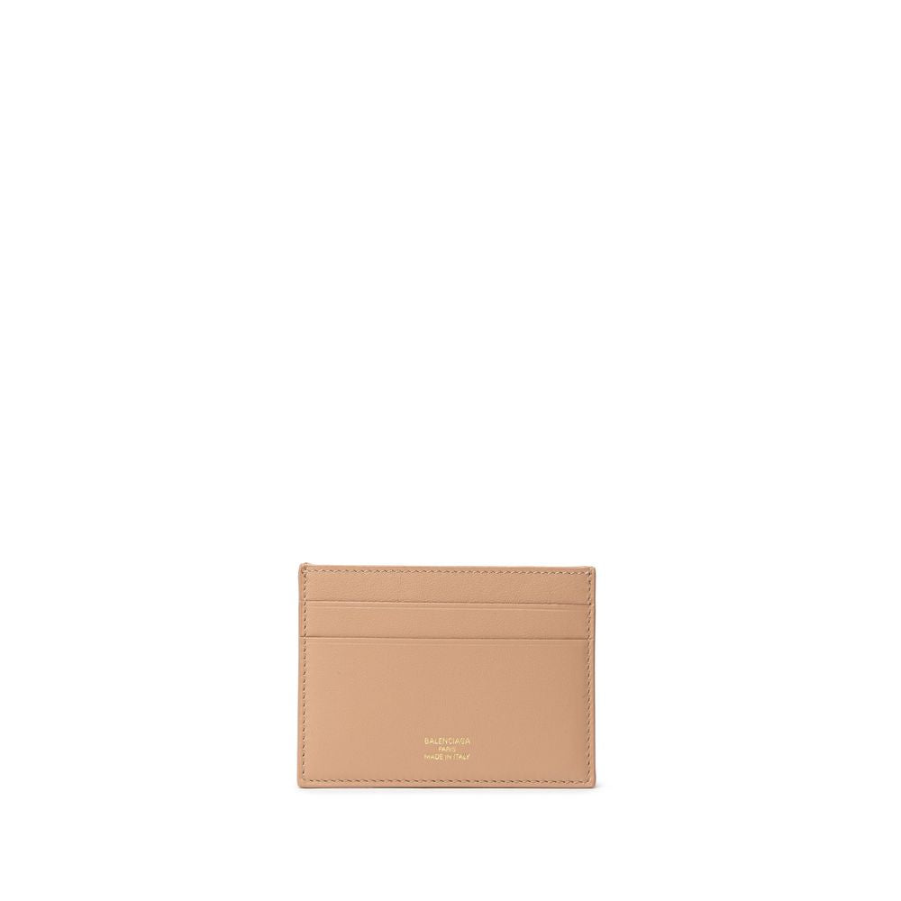 Beige leather Balenciaga card holder with gold logo and multiple card slots