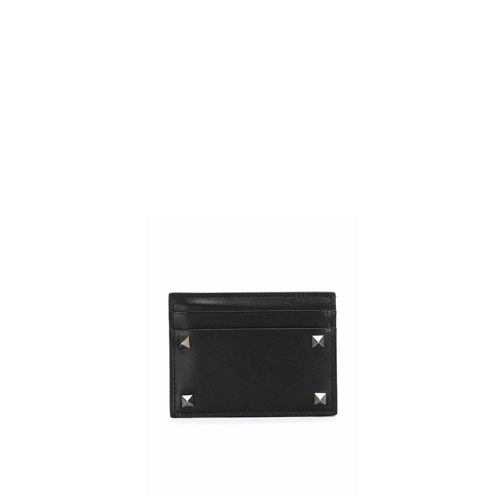 Black leather cardholder with silver pyramid studs and multiple card slots