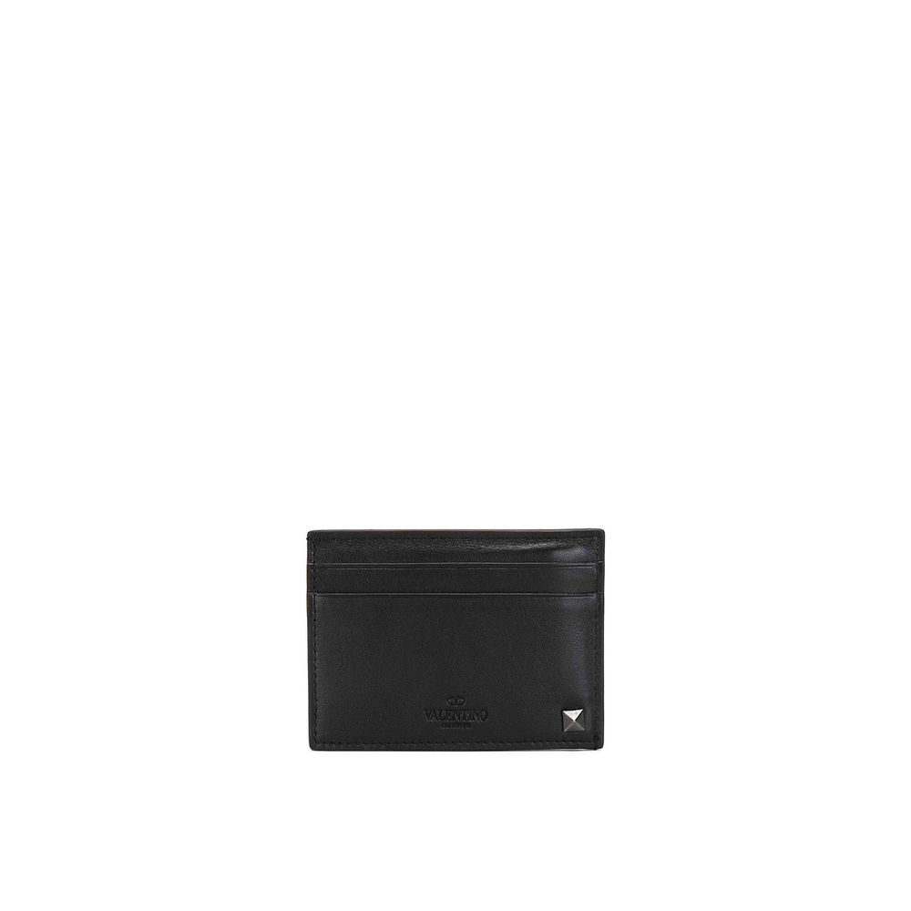 Black leather cardholder with silver pyramid studs and multiple card slots