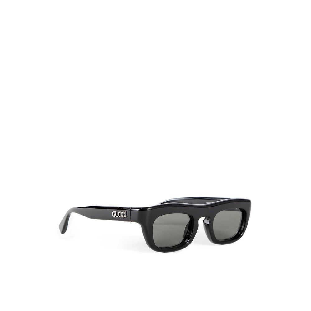 Black rectangular Gucci sunglasses with dark lenses on white background