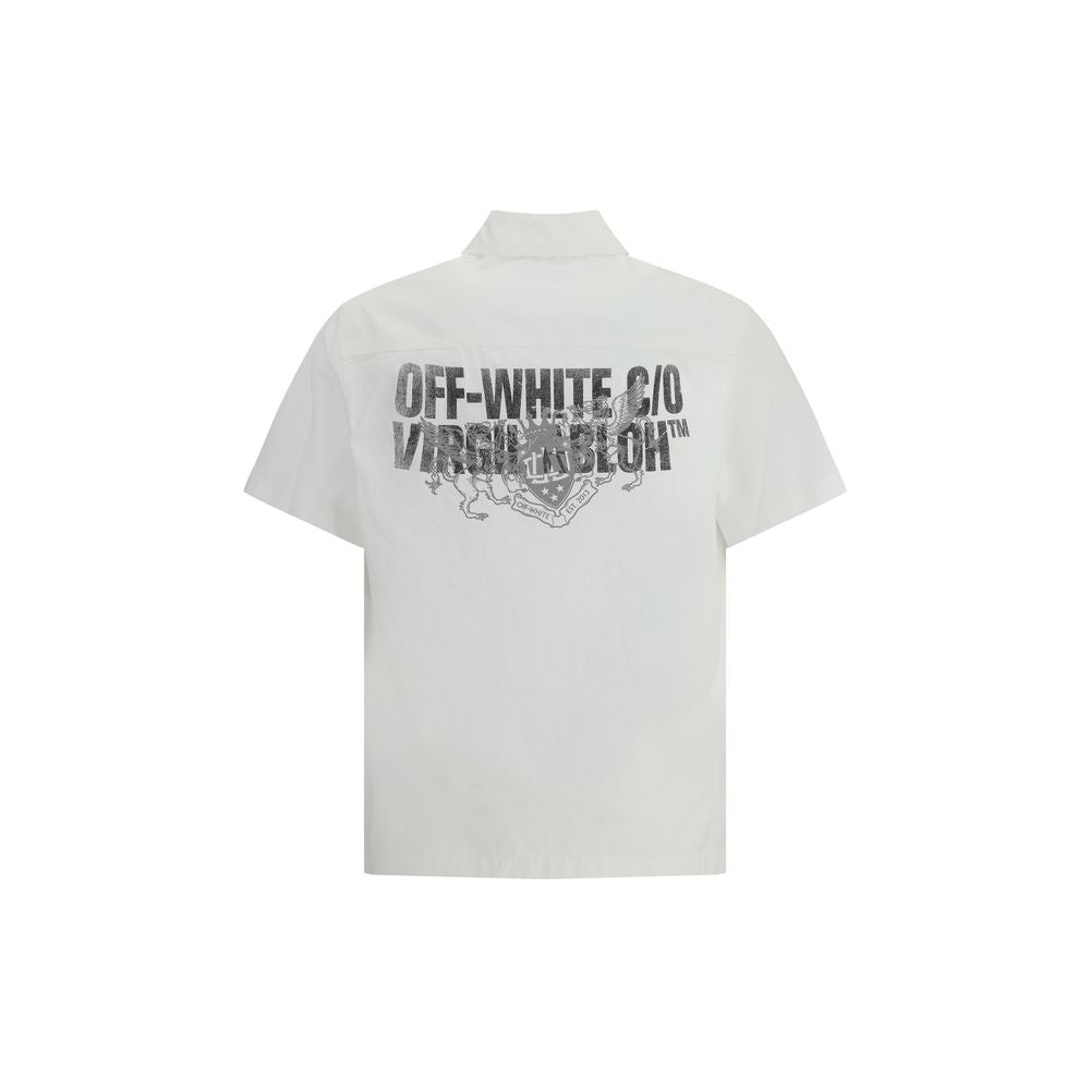 White short-sleeve button-up shirt with black and white text and graphic print on left chest