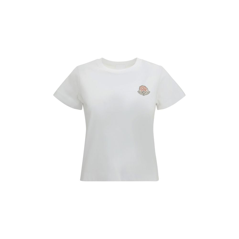 White short-sleeve women's t-shirt with small embroidered flower and Moncler logo on chest