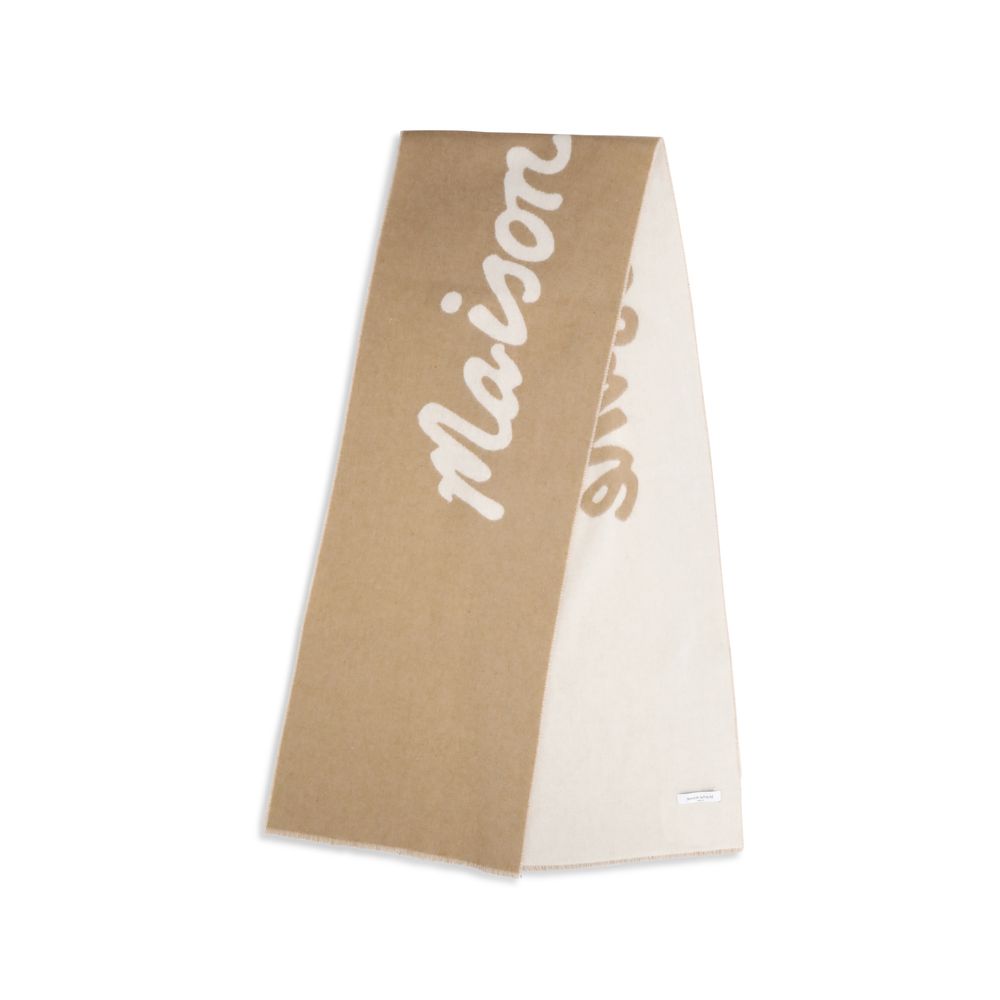 Beige blanket with white cursive text design on a white background