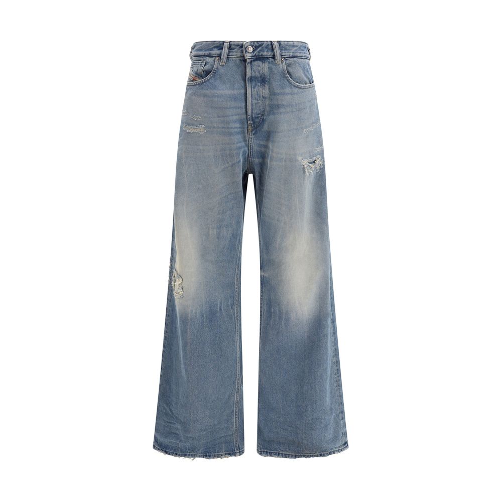 Wide-leg blue distressed denim jeans with faded patches and frayed hem on white background