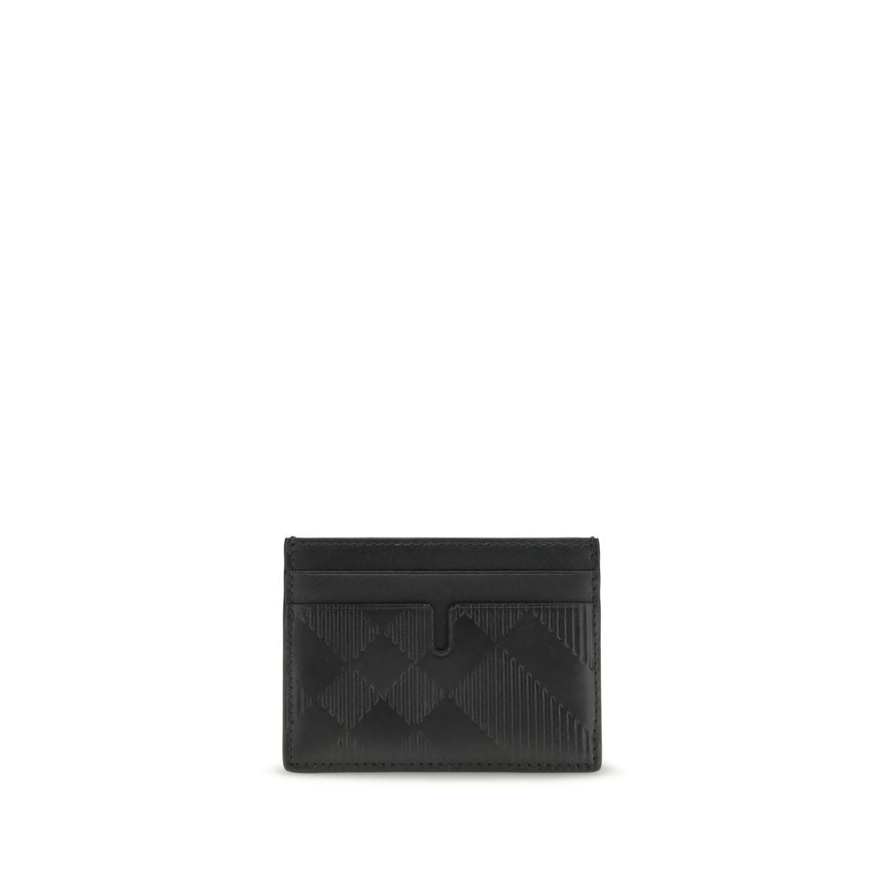 Black leather card holder with subtle embossed geometric pattern on white background
