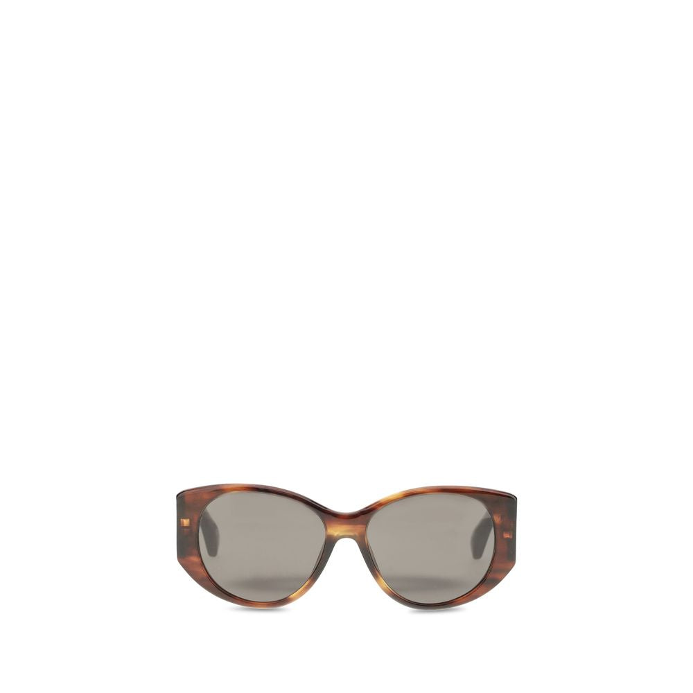 Tortoiseshell frame sunglasses with dark tinted lenses on white background