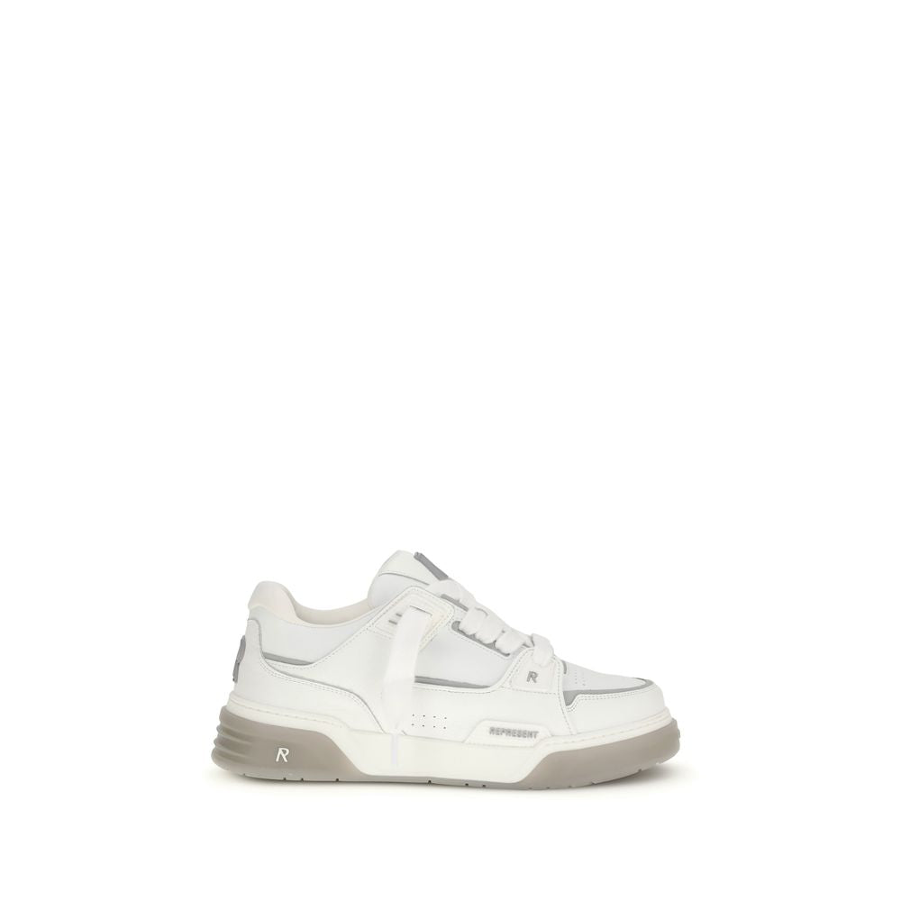 White low-top Represent brand sneaker with gray sole and detailed stitching