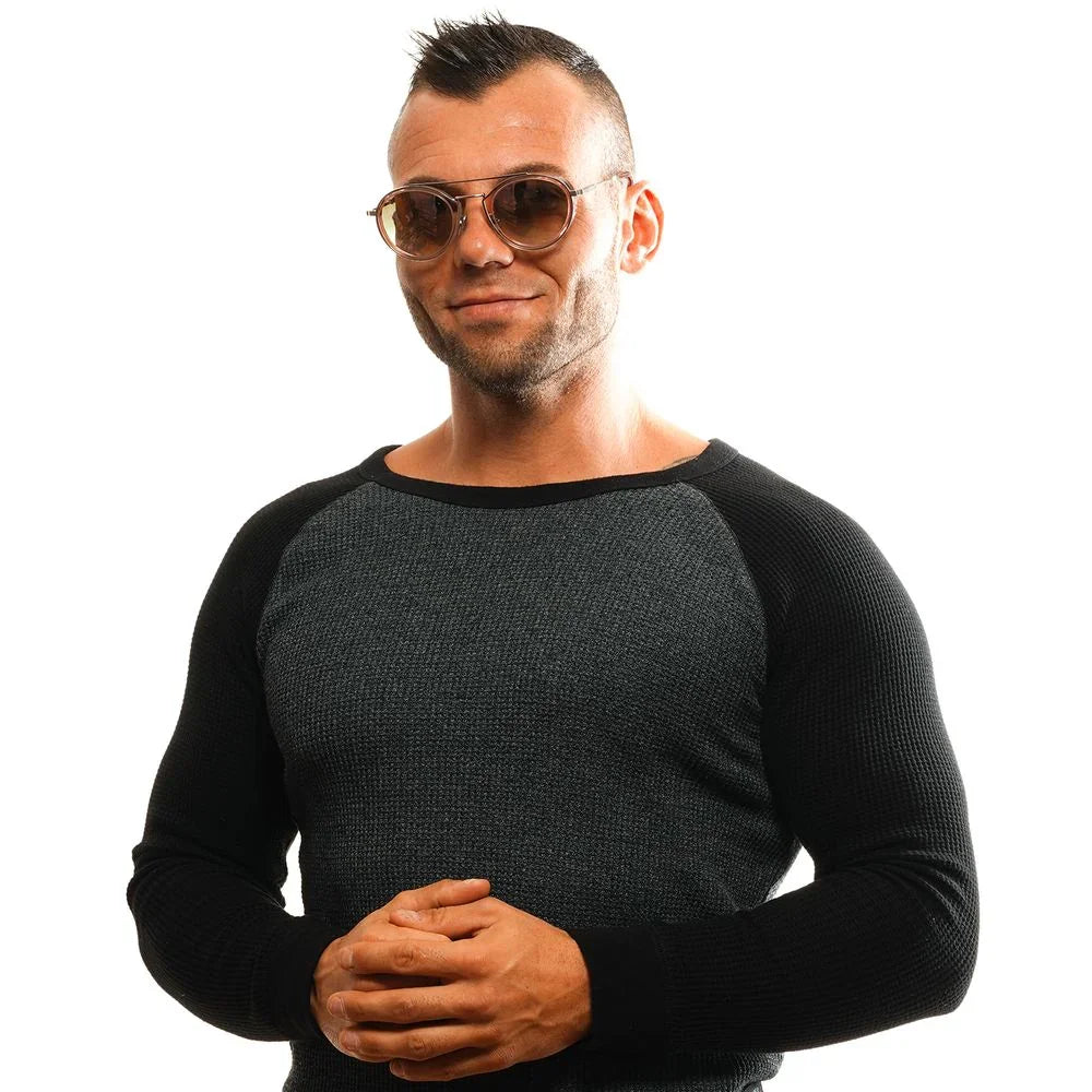 man with mohawk hairstyle wearing brown sunglasses and black gray knit sweater