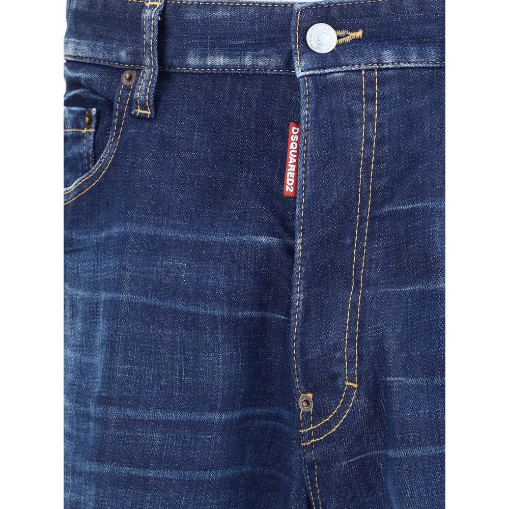 Close-up of blue Dsquared2 denim jeans with visible fading and yellow stitching