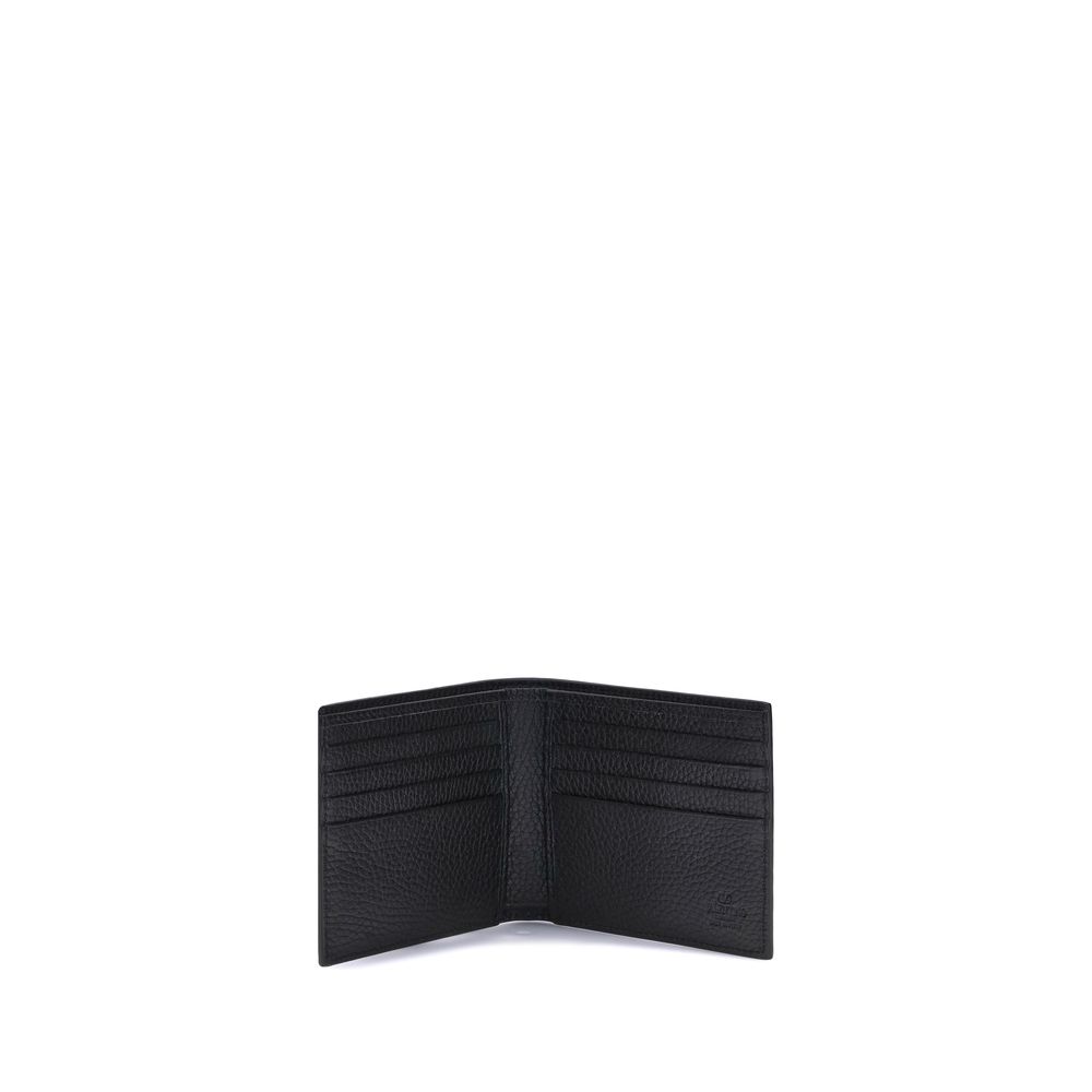 Open black leather wallet showing multiple card slots and textured finish