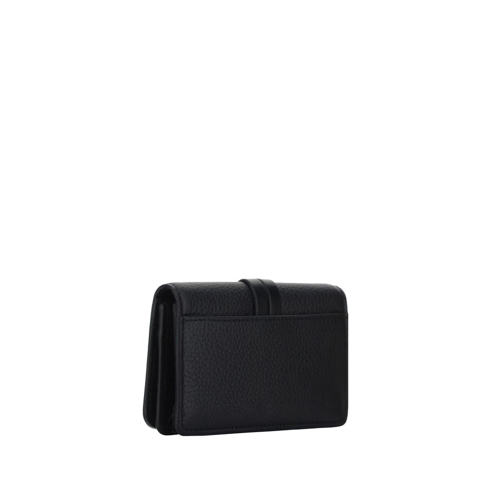 Black leather wallet with textured finish and gold charm detail on front