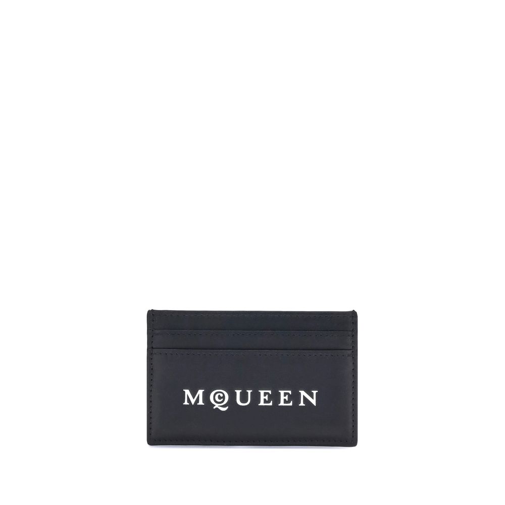 Black McQueen leather cardholder with white logo and multiple card slots