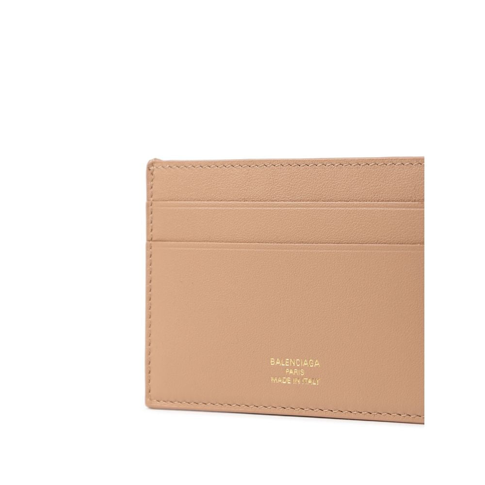 Beige Balenciaga leather card holder with gold logo, made in Italy, minimal design