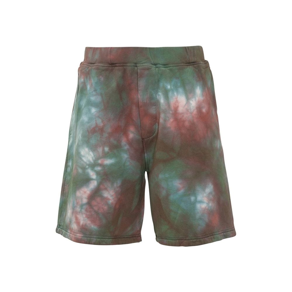 Tie-dye men's shorts with green, red, and white abstract patterns on a white background