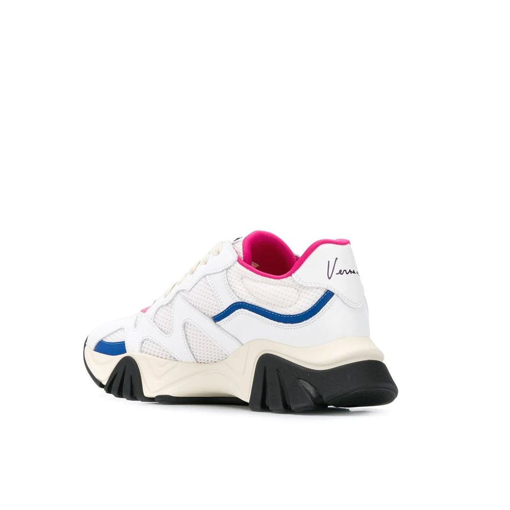 White sneaker with blue accents, pink inner lining, and black sole on white background