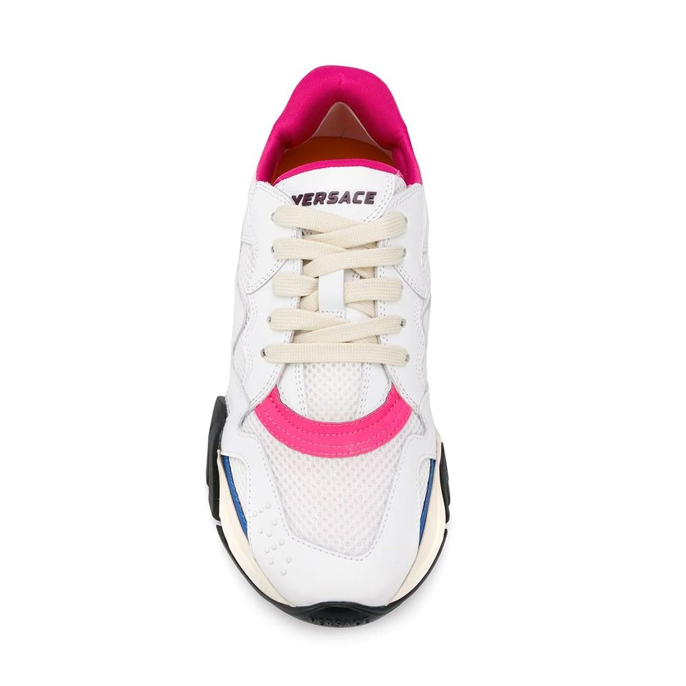 White Versace sneaker with beige laces, pink and blue accents, and pink inner lining