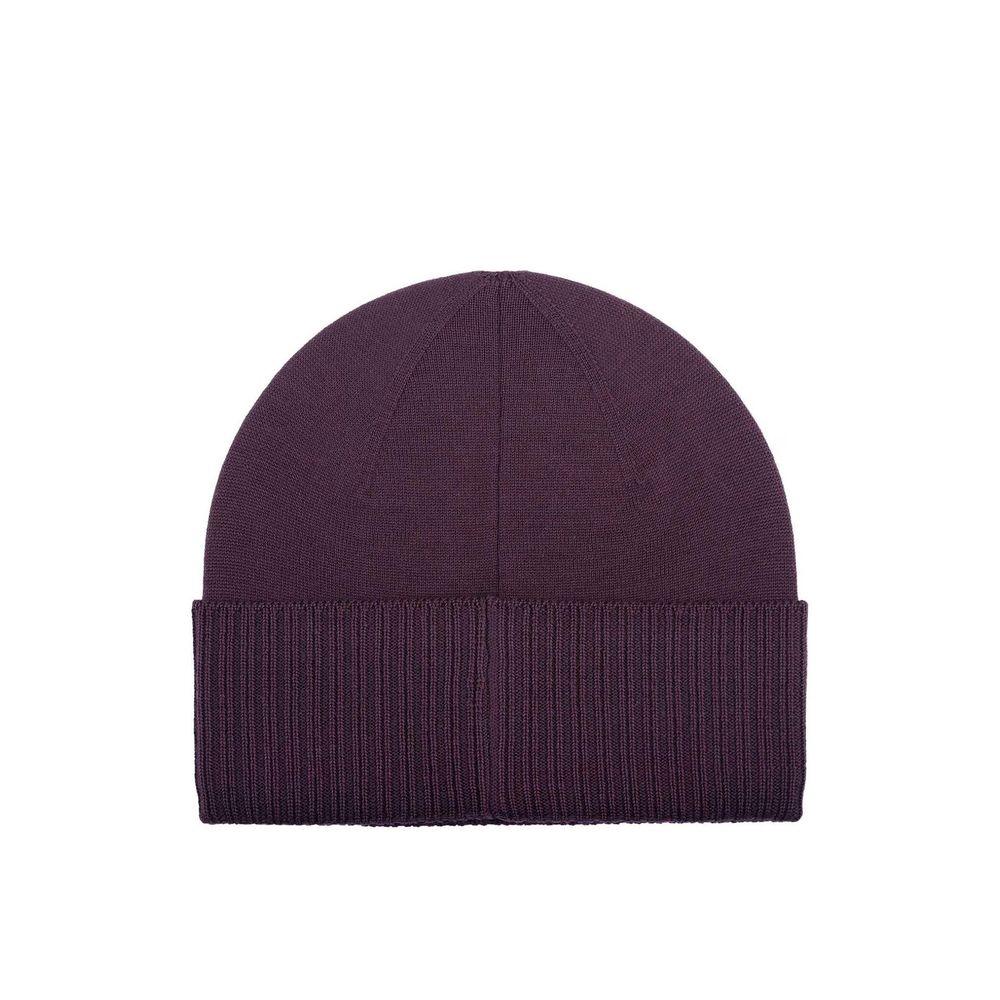 Dark purple ribbed knit beanie with folded cuff on white background