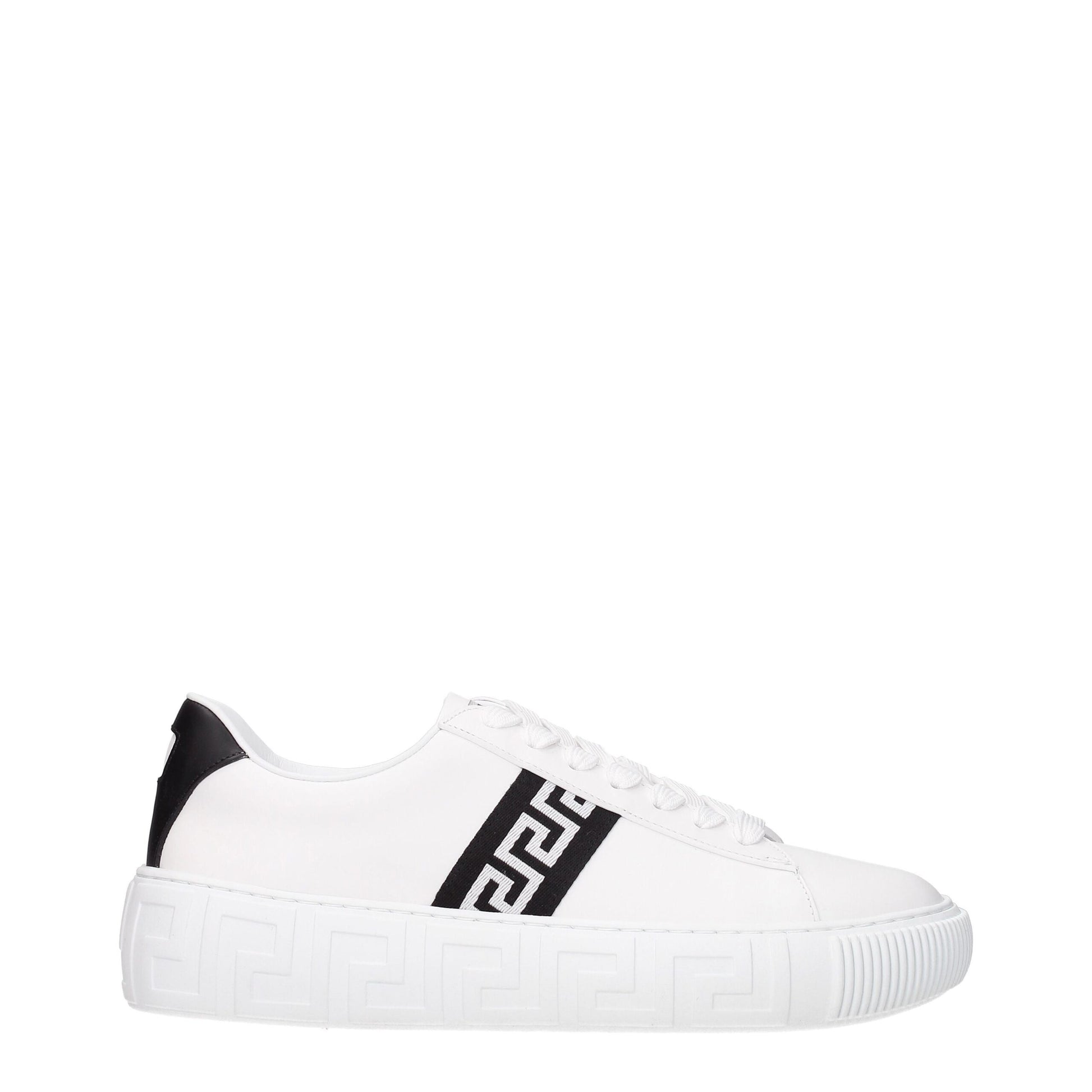 White low-top sneaker with black geometric pattern and embossed sole detail