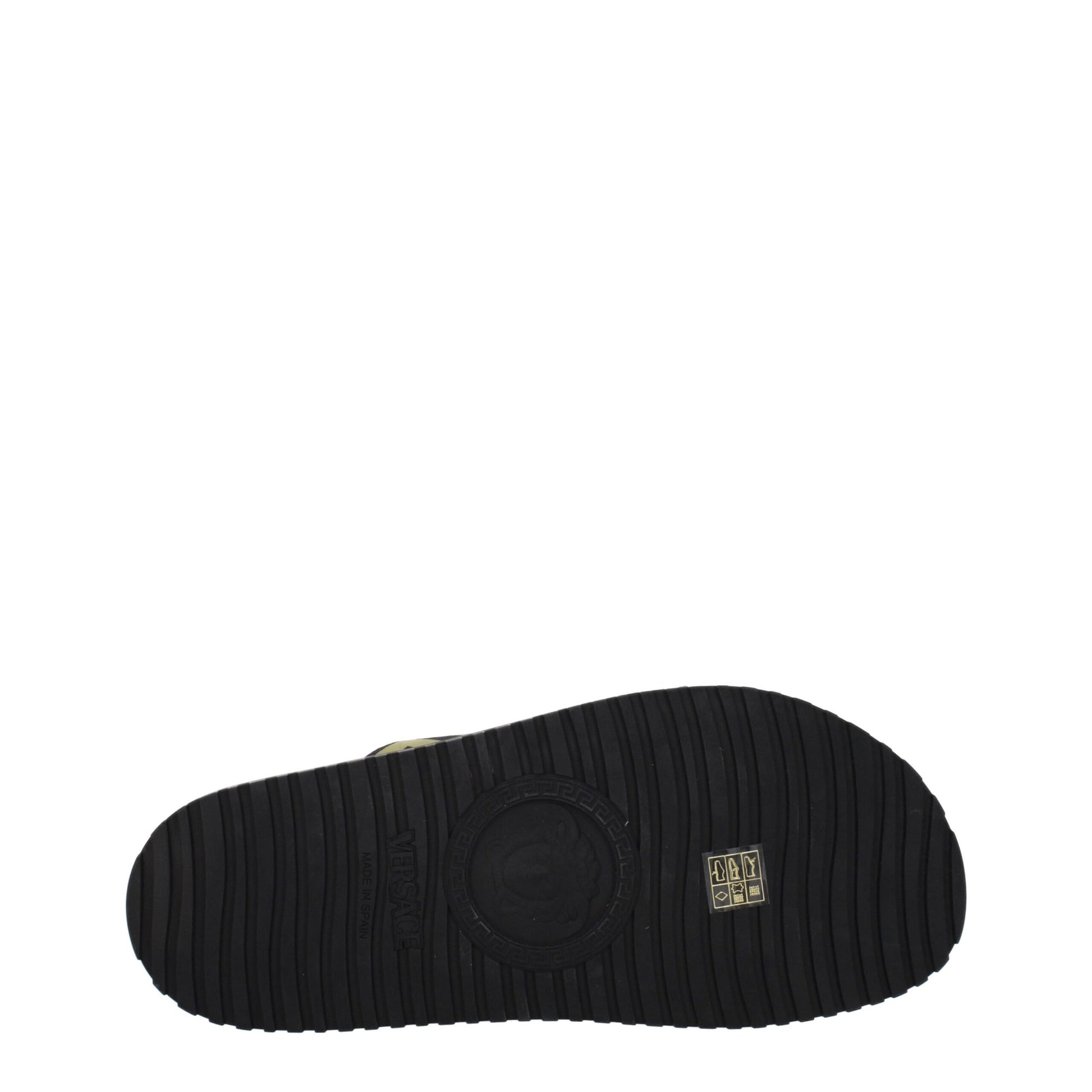 Black rubber sole of Versace sneaker with Medusa logo and tread pattern, made in Spain