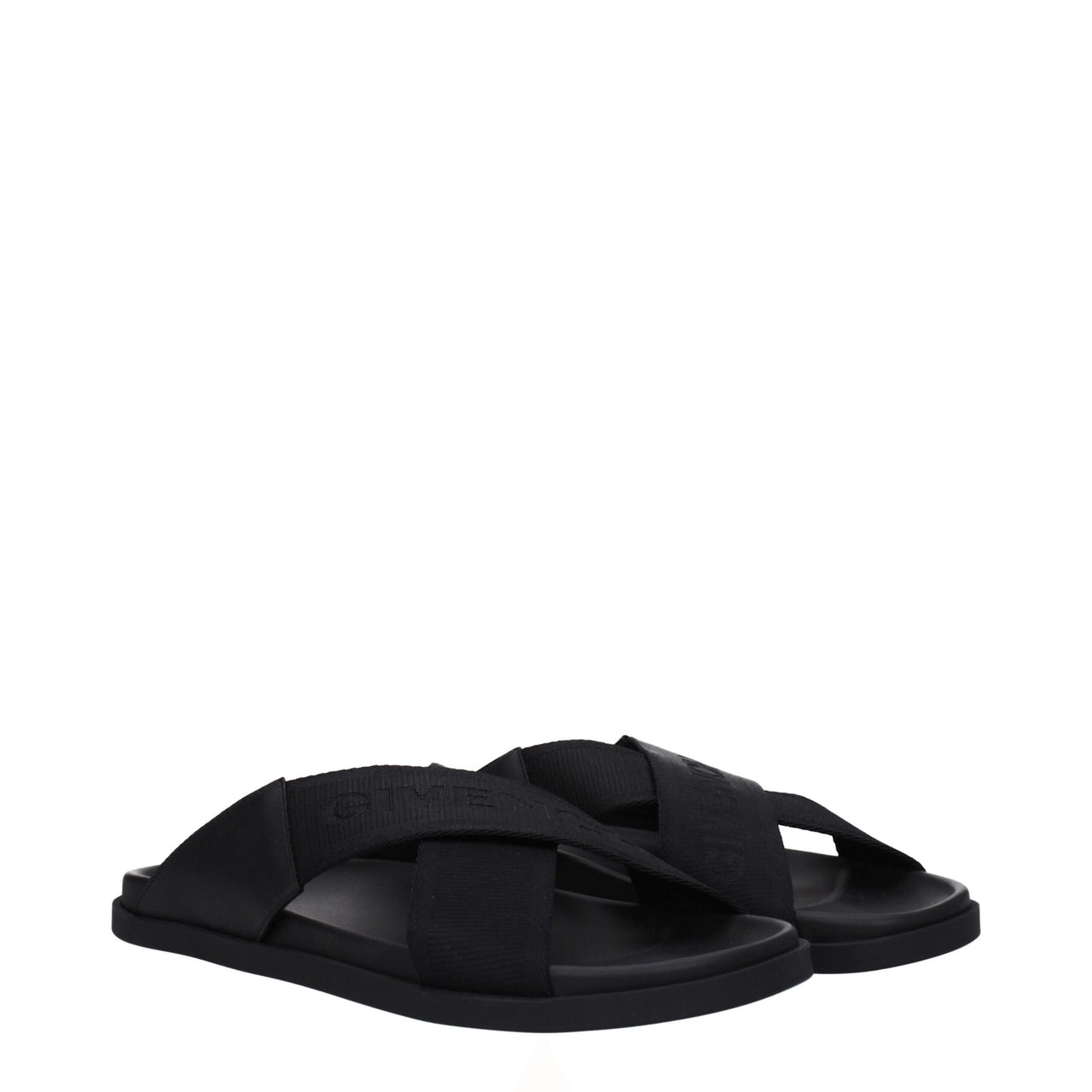 Minimalist black slide sandal with crisscross fabric straps and cushioned sole