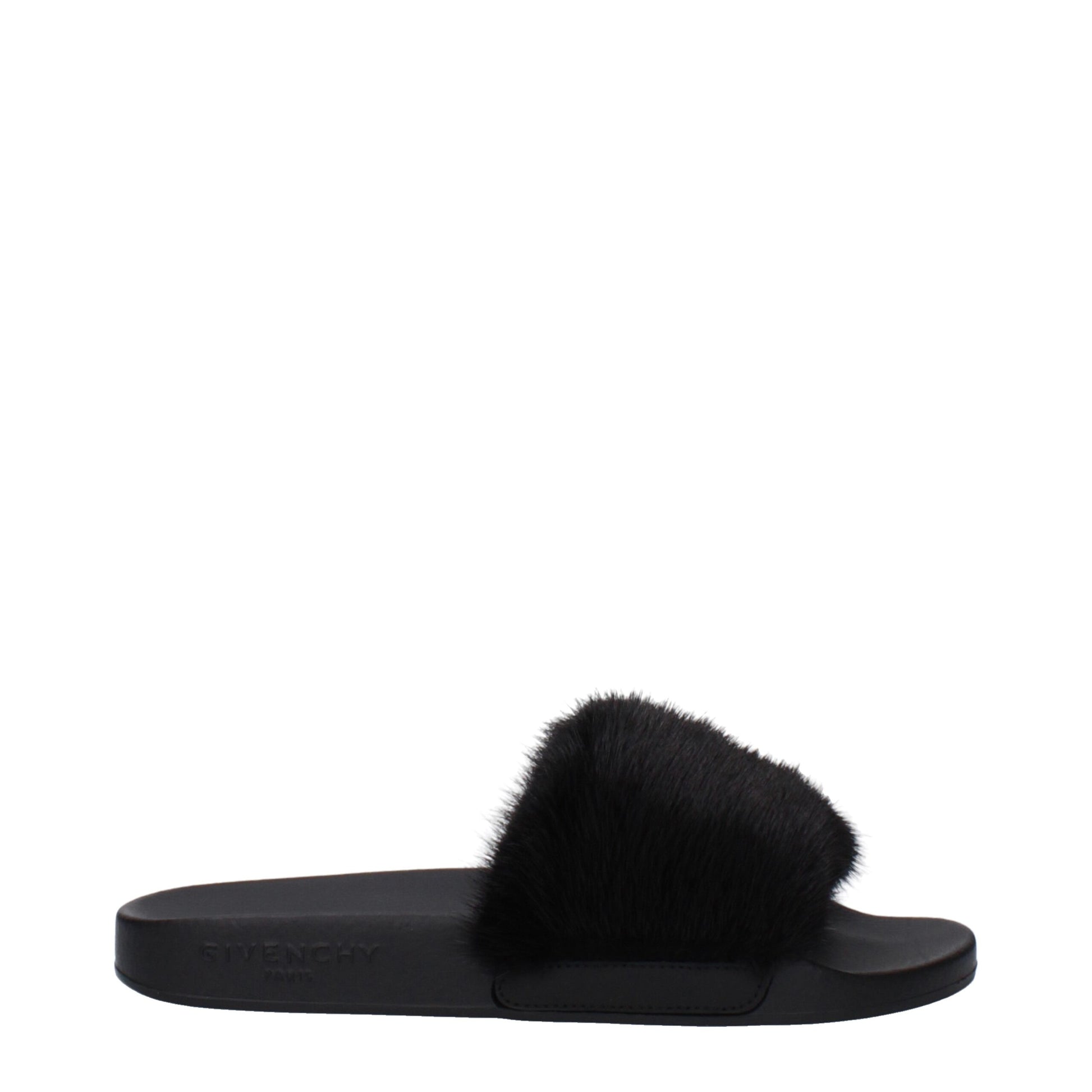 Black Givenchy slide sandal with furry strap and embossed logo on sole
