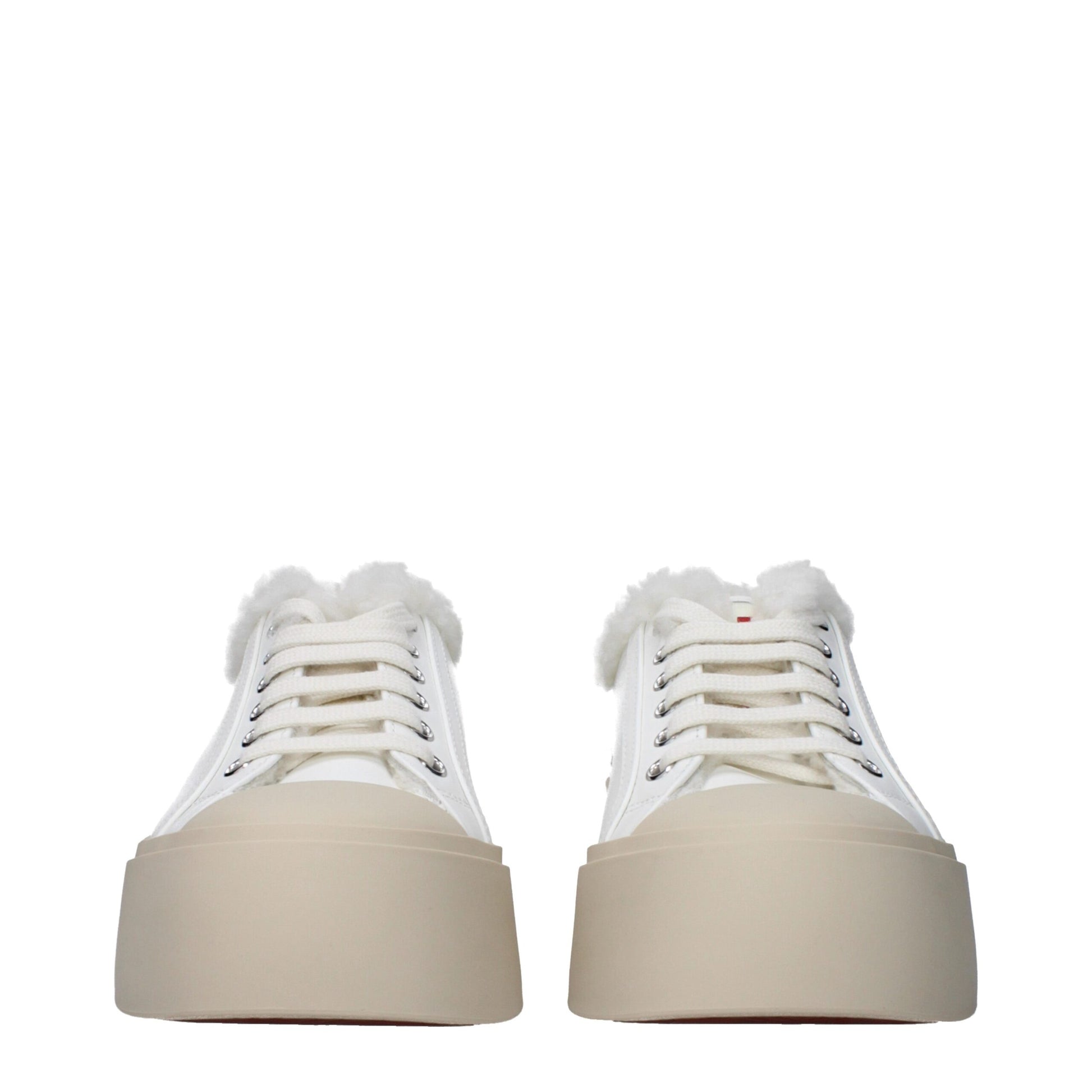 Front view platform sneakers in white with thick beige sole and fluffy white lining