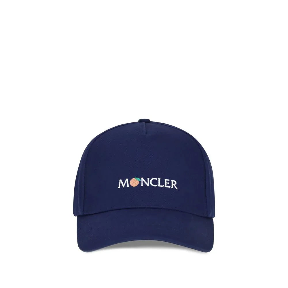 Navy blue Moncler baseball cap with embroidered logo and peach design on front