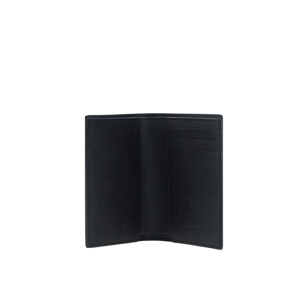 Open black leather wallet with card slots and textured finish on white background