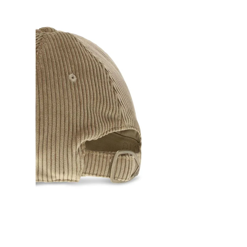 Beige corduroy baseball cap with adjustable strap and metal buckle on white background