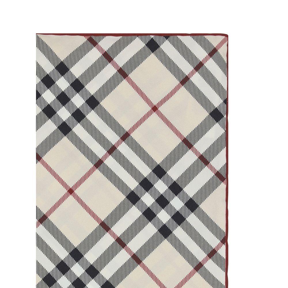 Beige scarf with classic black, white, and red plaid pattern and red edge trim