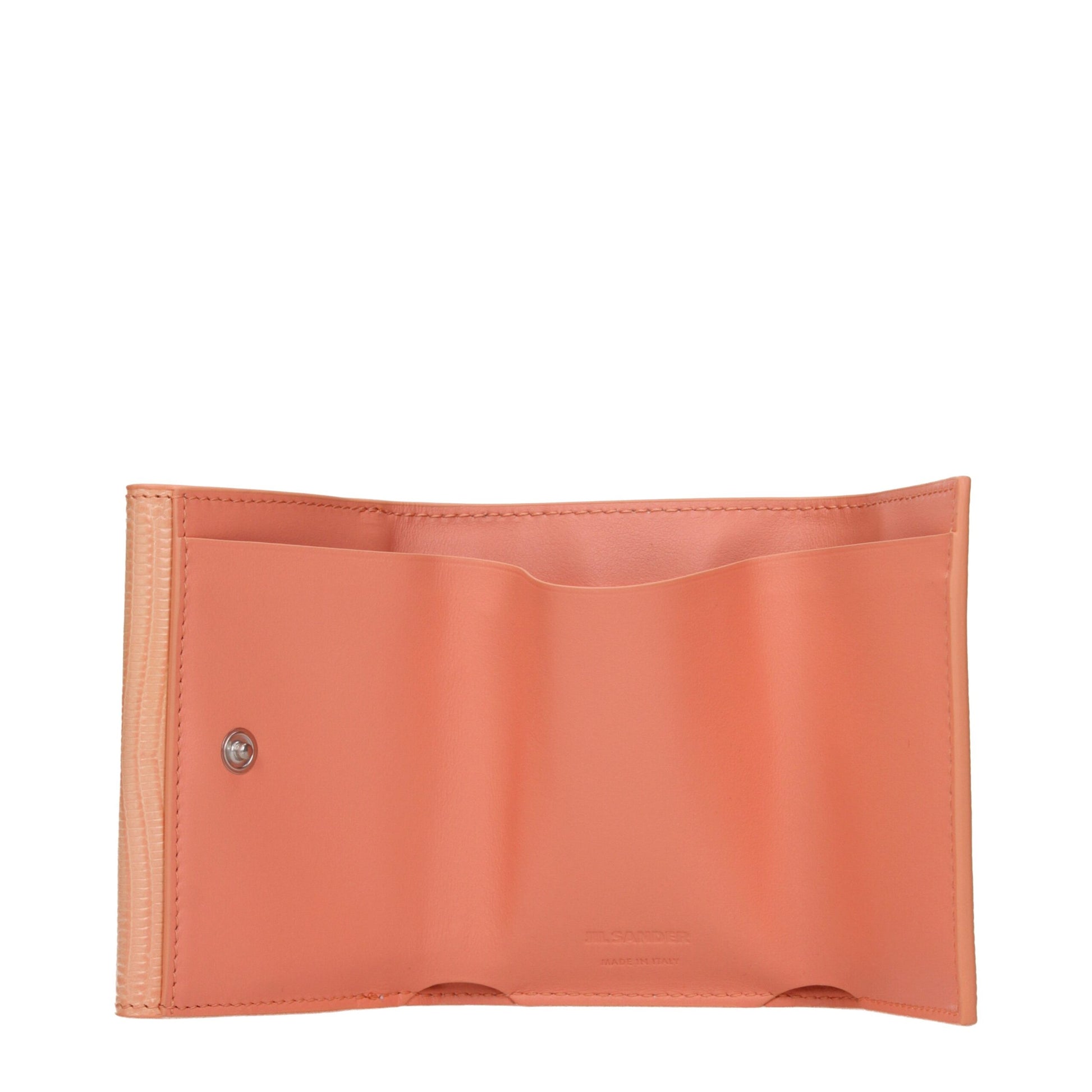 Open salmon pink leather wallet with multiple card slots and button closure