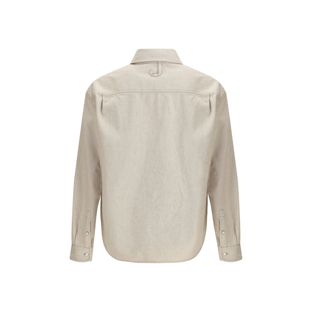 Beige long-sleeve button-up shirt with collar and subtle Jacquemus logo embroidery