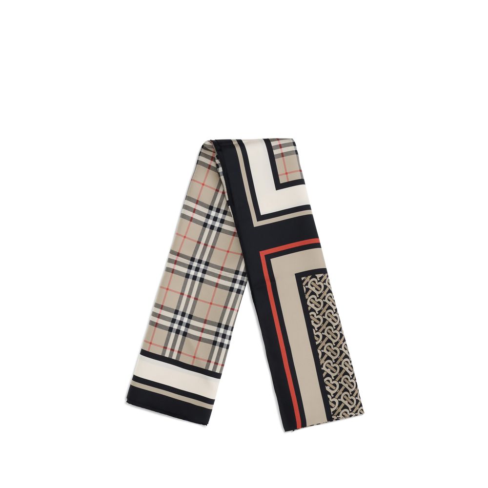 Elegant silk scarf featuring classic check and monogram patterns with black, beige, and red accents