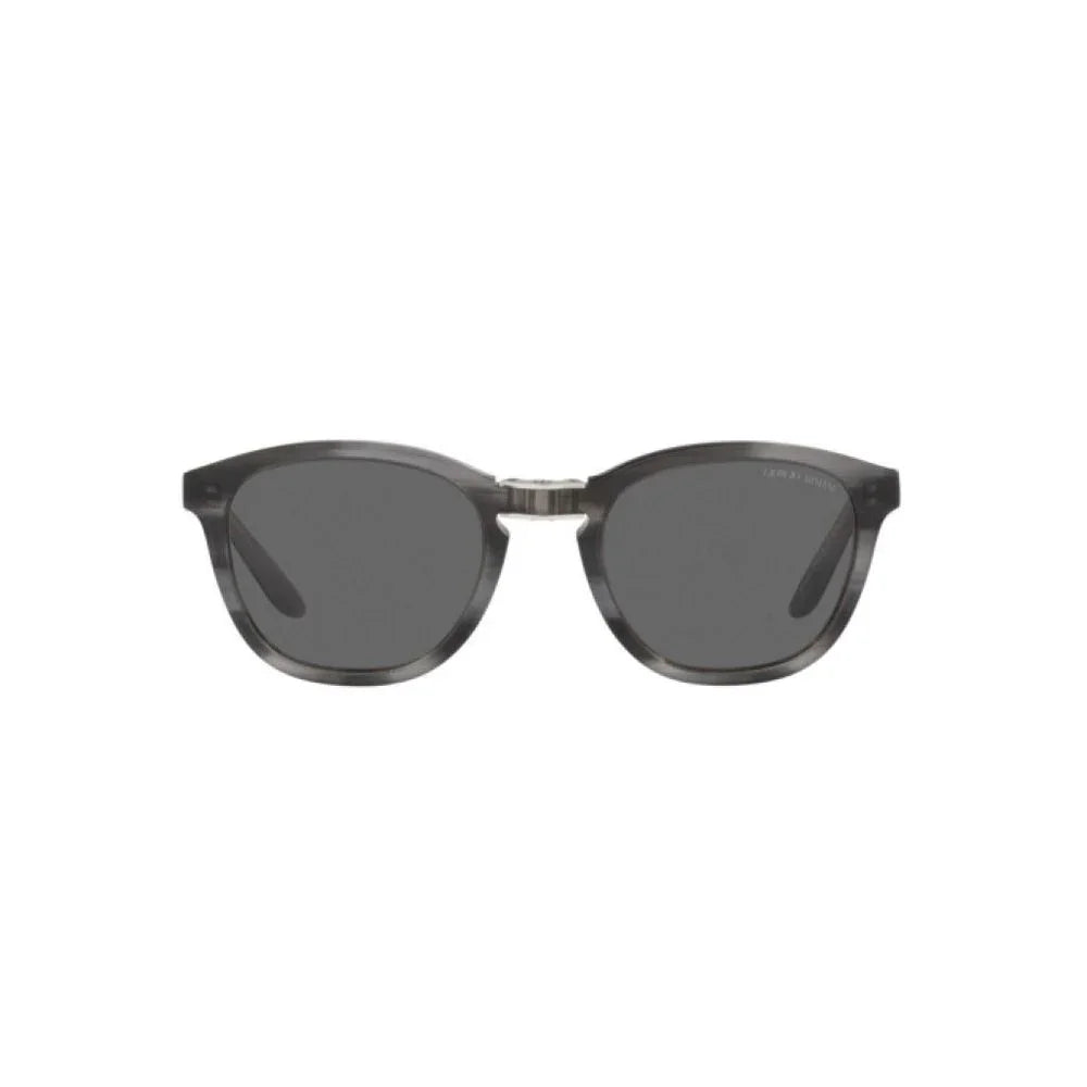 Classic vintage-inspired sunglasses with dark lenses and translucent gray frame