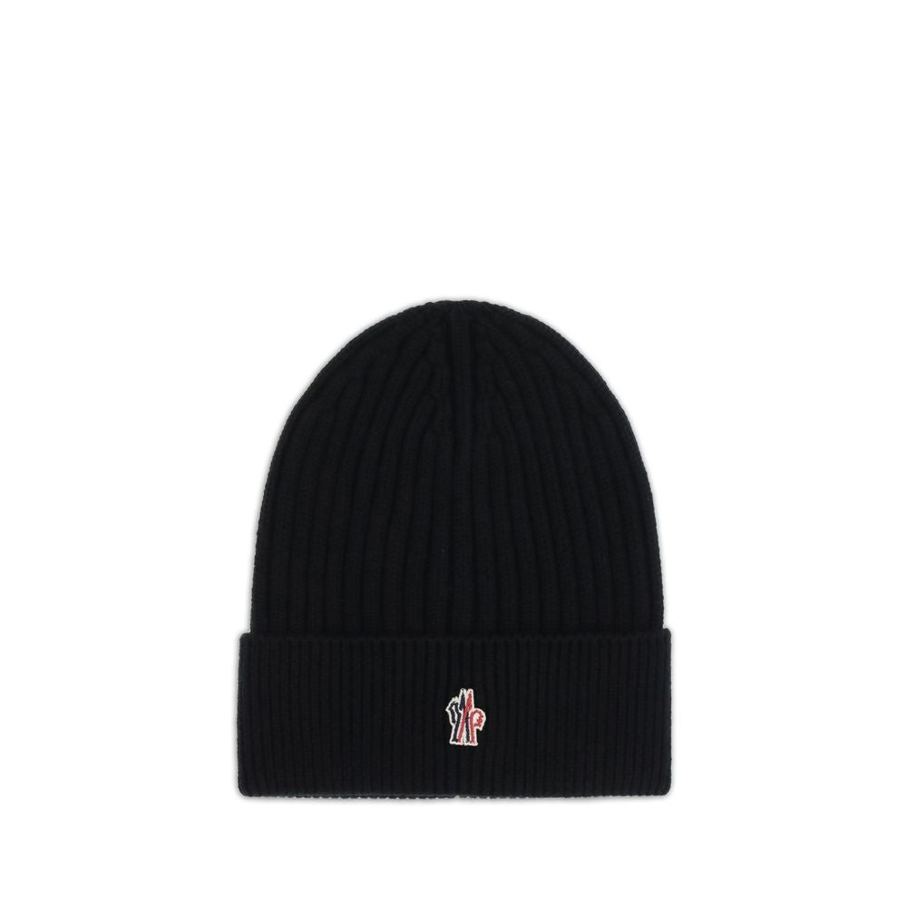 Black ribbed knit beanie with folded cuff and small embroidered logo on front