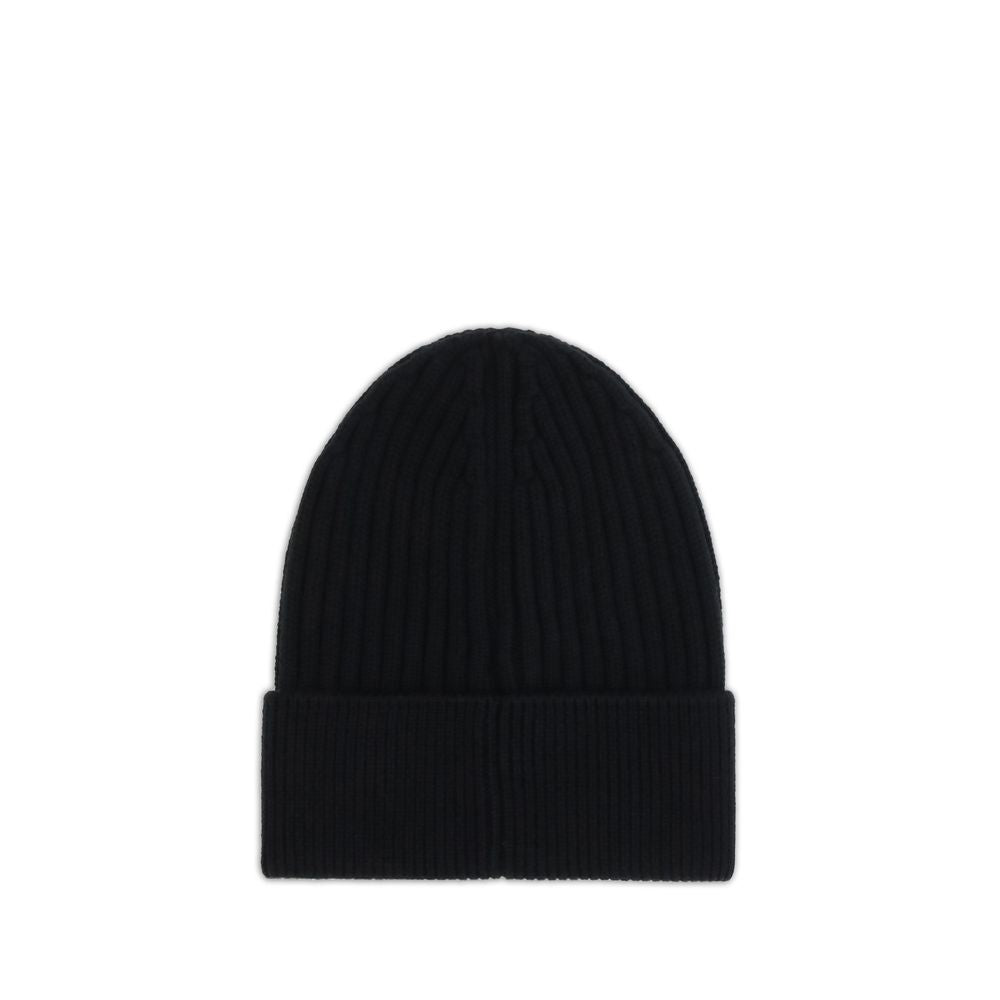 Black ribbed knit beanie hat with folded cuff on white background