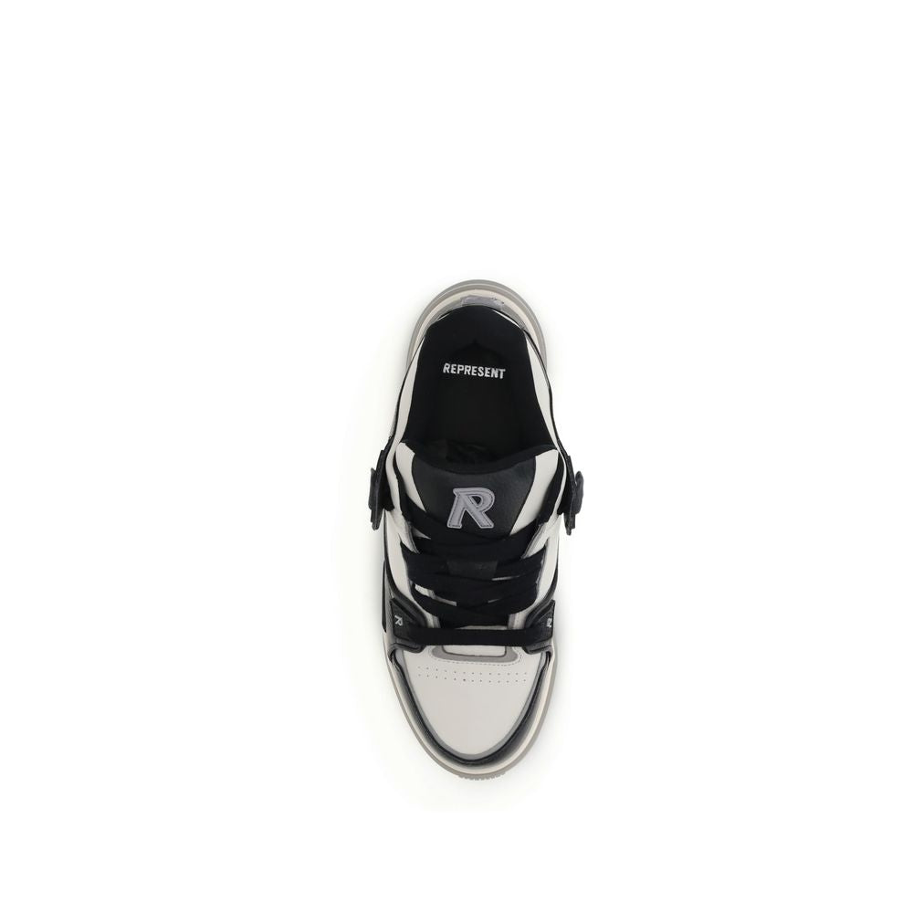 Top view of black and white Represent sneaker with 'R' logo and thick laces on white background