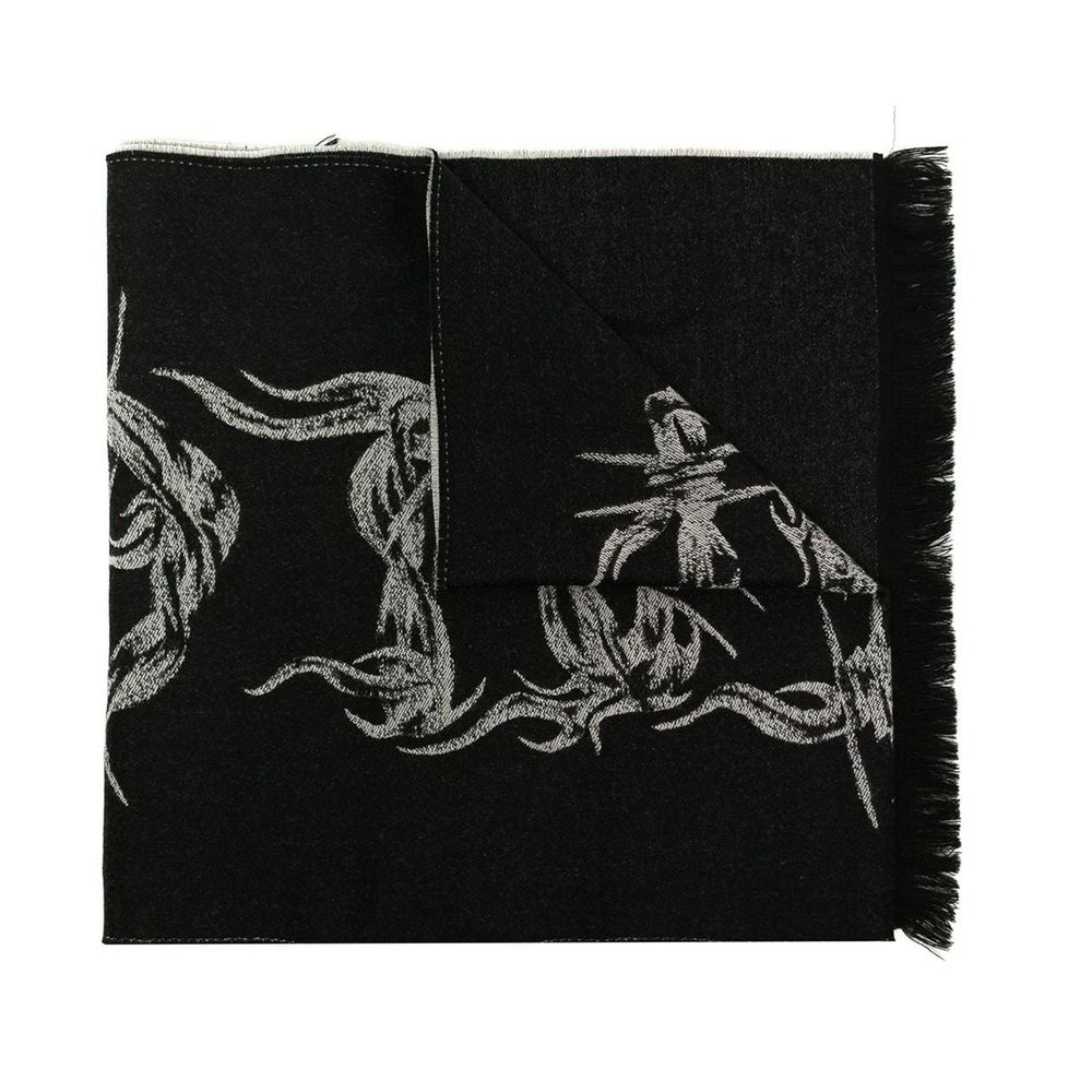 Black scarf with gray barbed wire pattern and fringed edges folded on white background