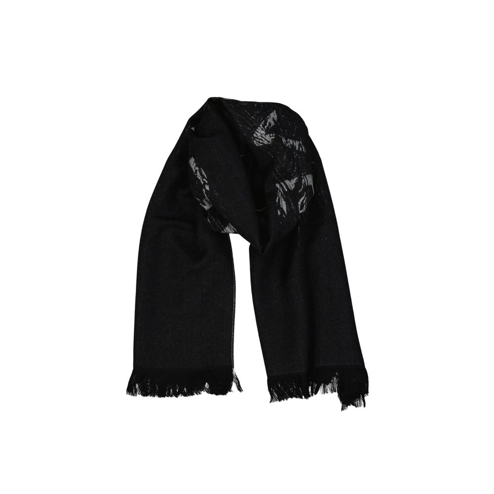 Black scarf with subtle butterfly pattern and fringed edges on white background