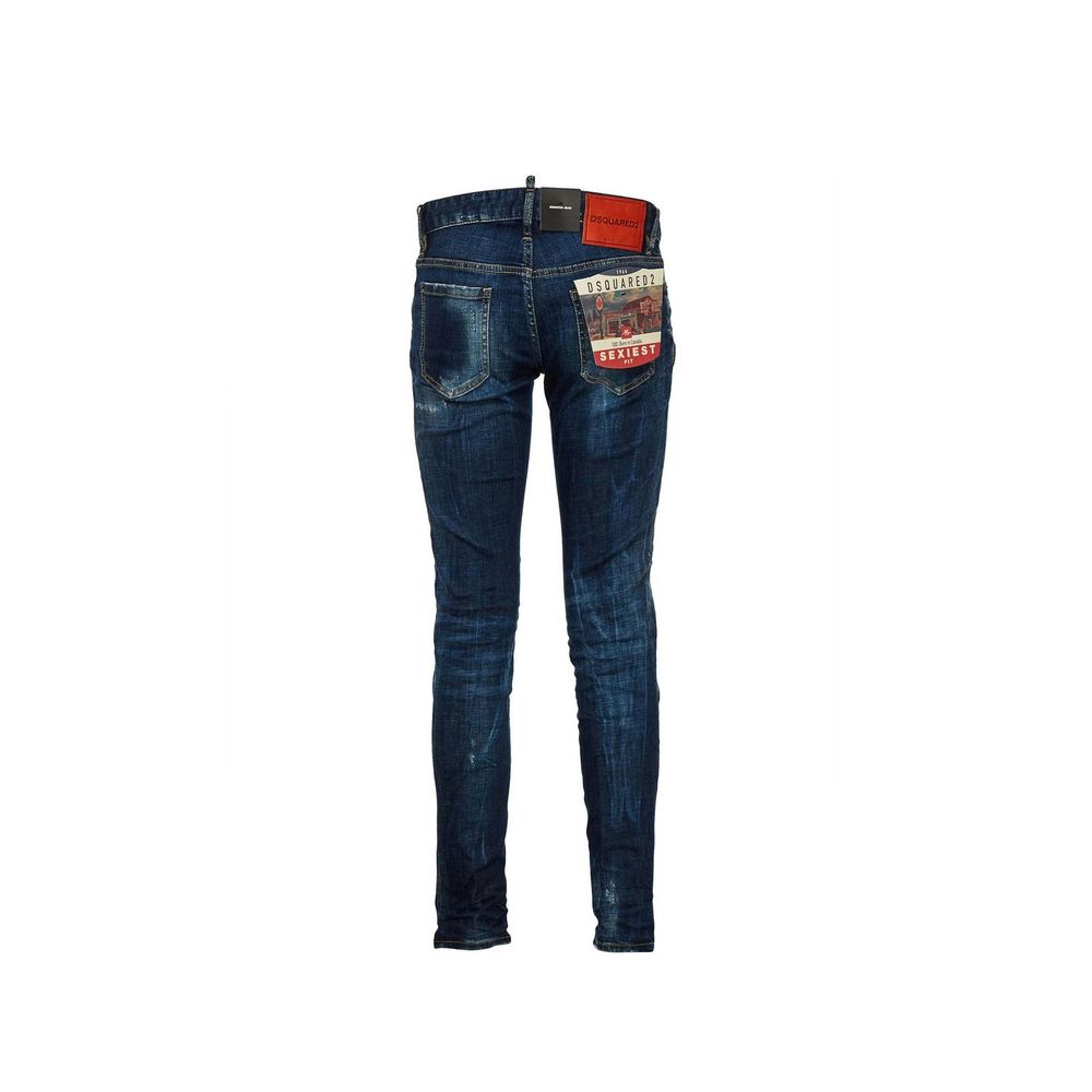 Dark blue skinny jeans with distressed details and whiskering effect on white background