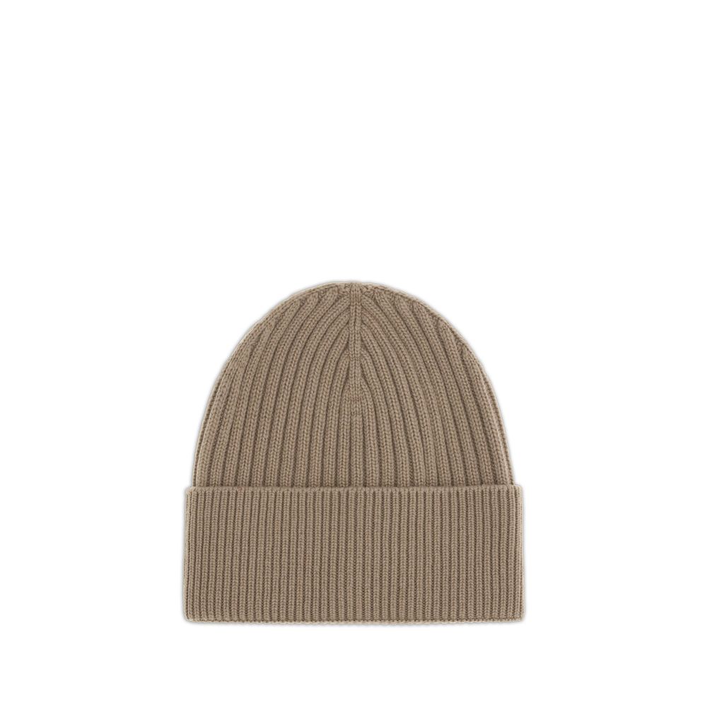 Beige ribbed knit beanie hat with a folded cuff on white background