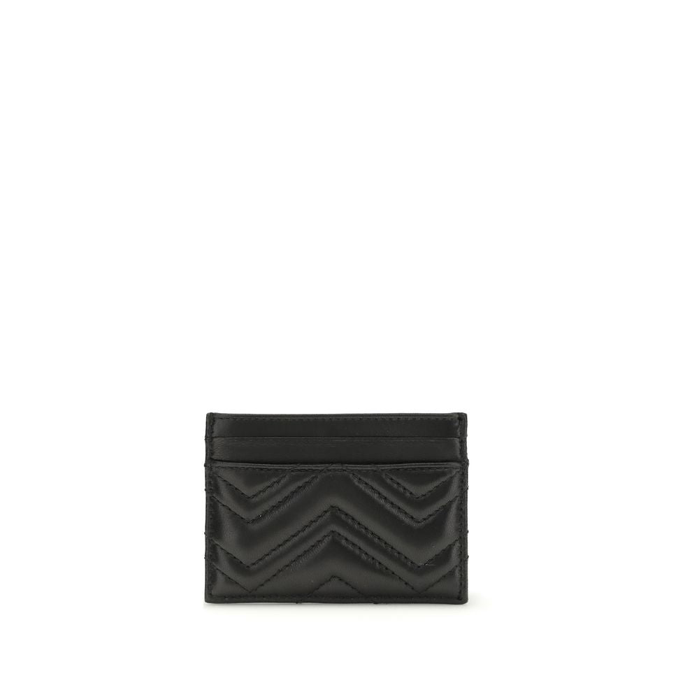 Black quilted leather cardholder with chevron stitching and multiple card slots