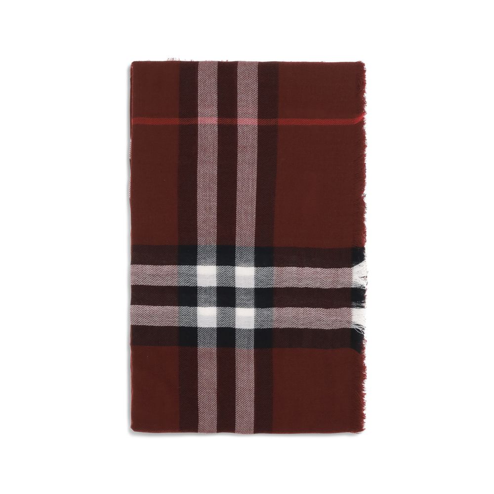 Folded brown plaid scarf with black, white, and red stripes on white background