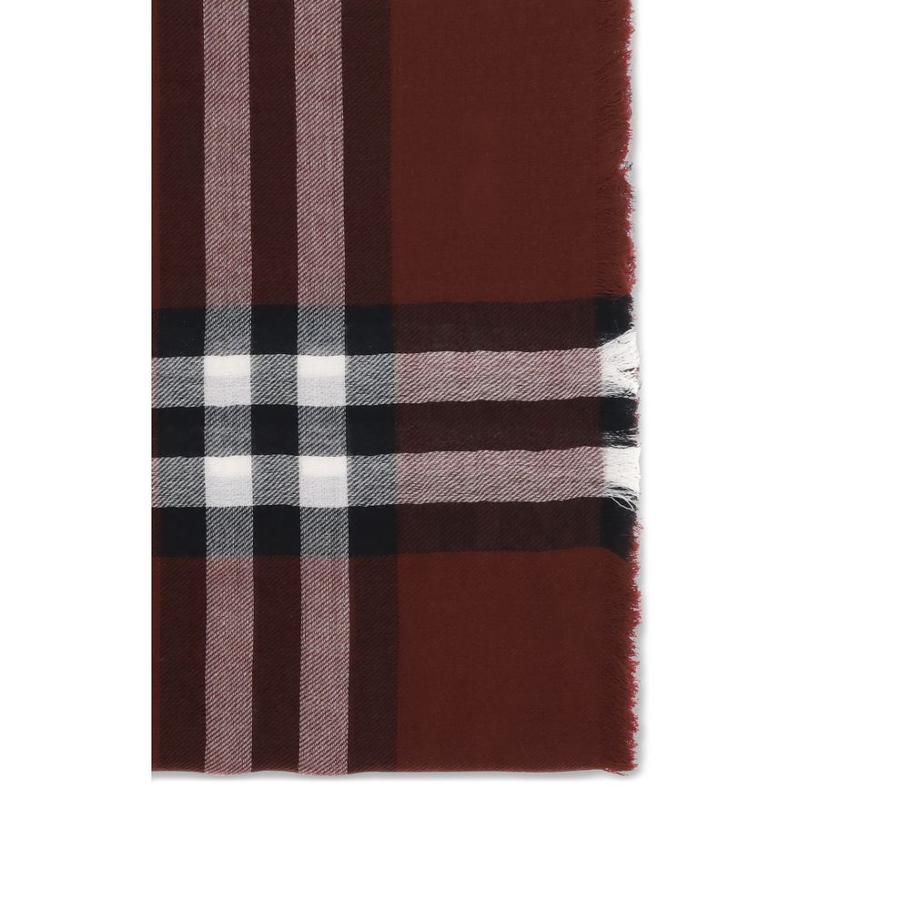 Burgundy plaid scarf with white, black, and pink stripes and frayed edges