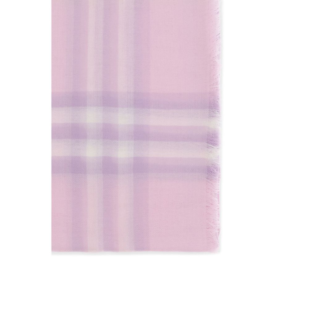 Soft pink plaid fabric with white and lavender stripes and fringed edge