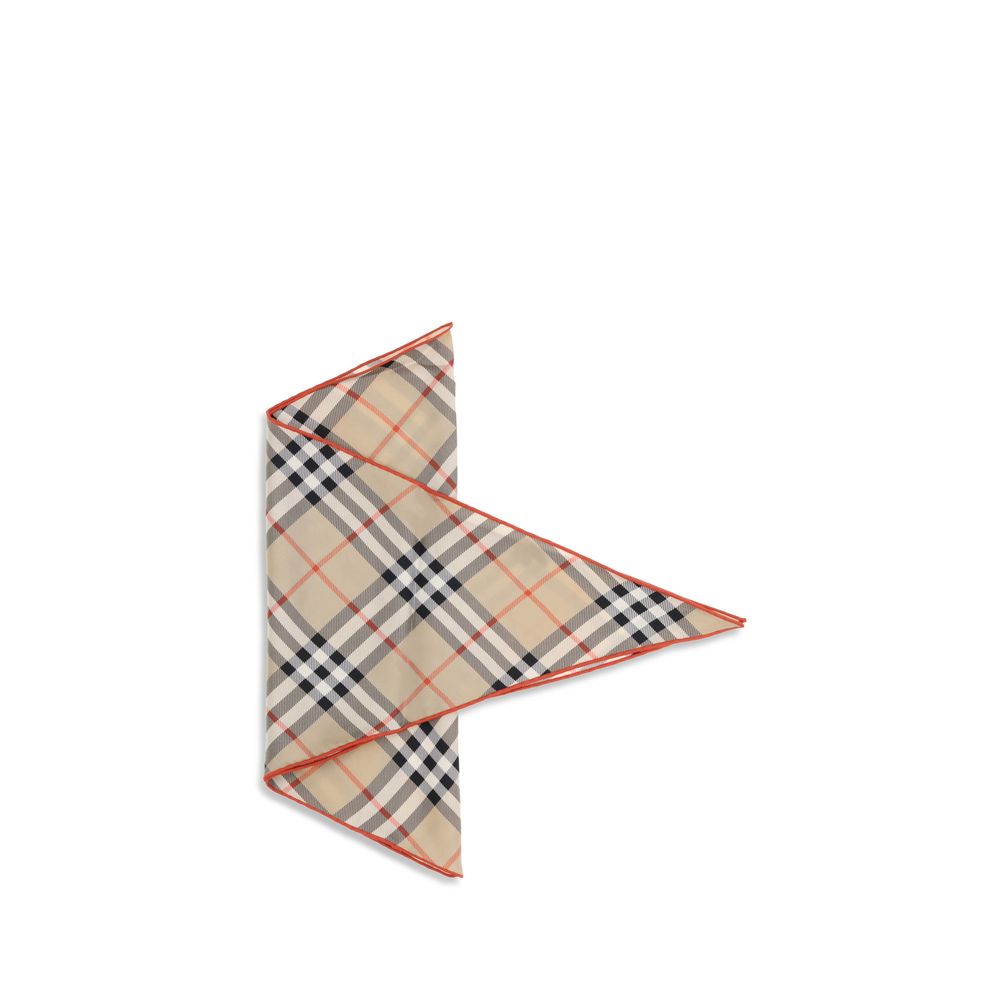 Beige plaid silk scarf with red edges folded on white background