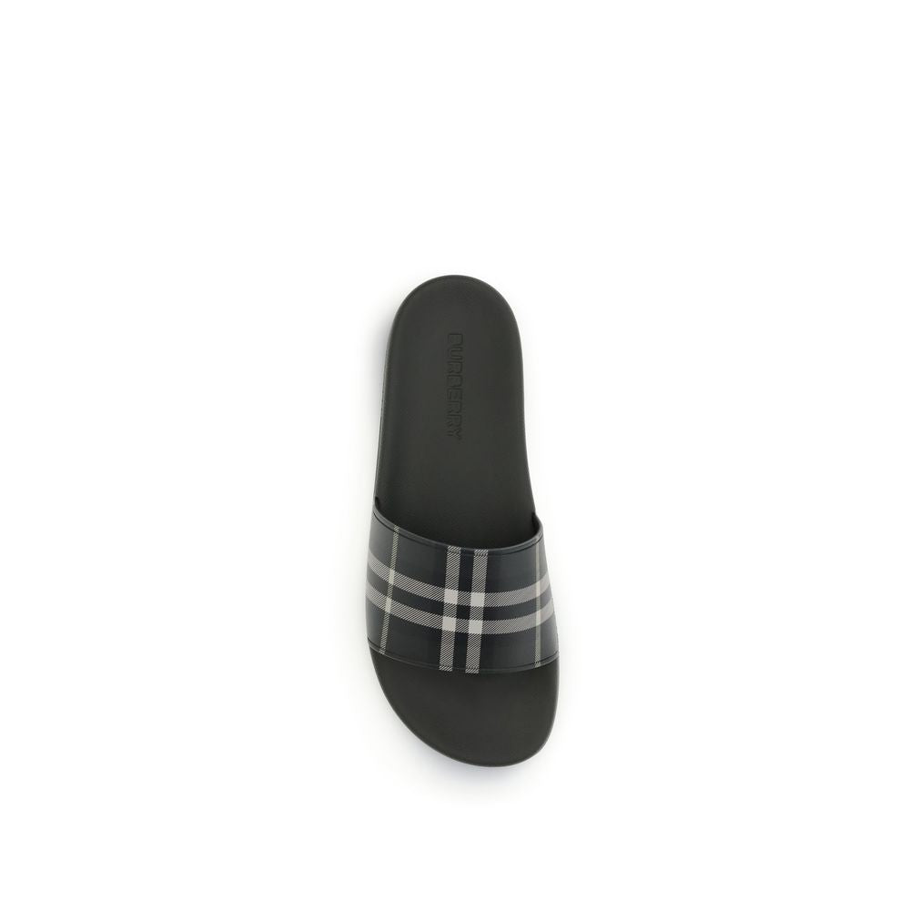 Black slide sandal with classic check pattern strap and embossed footbed brand logo