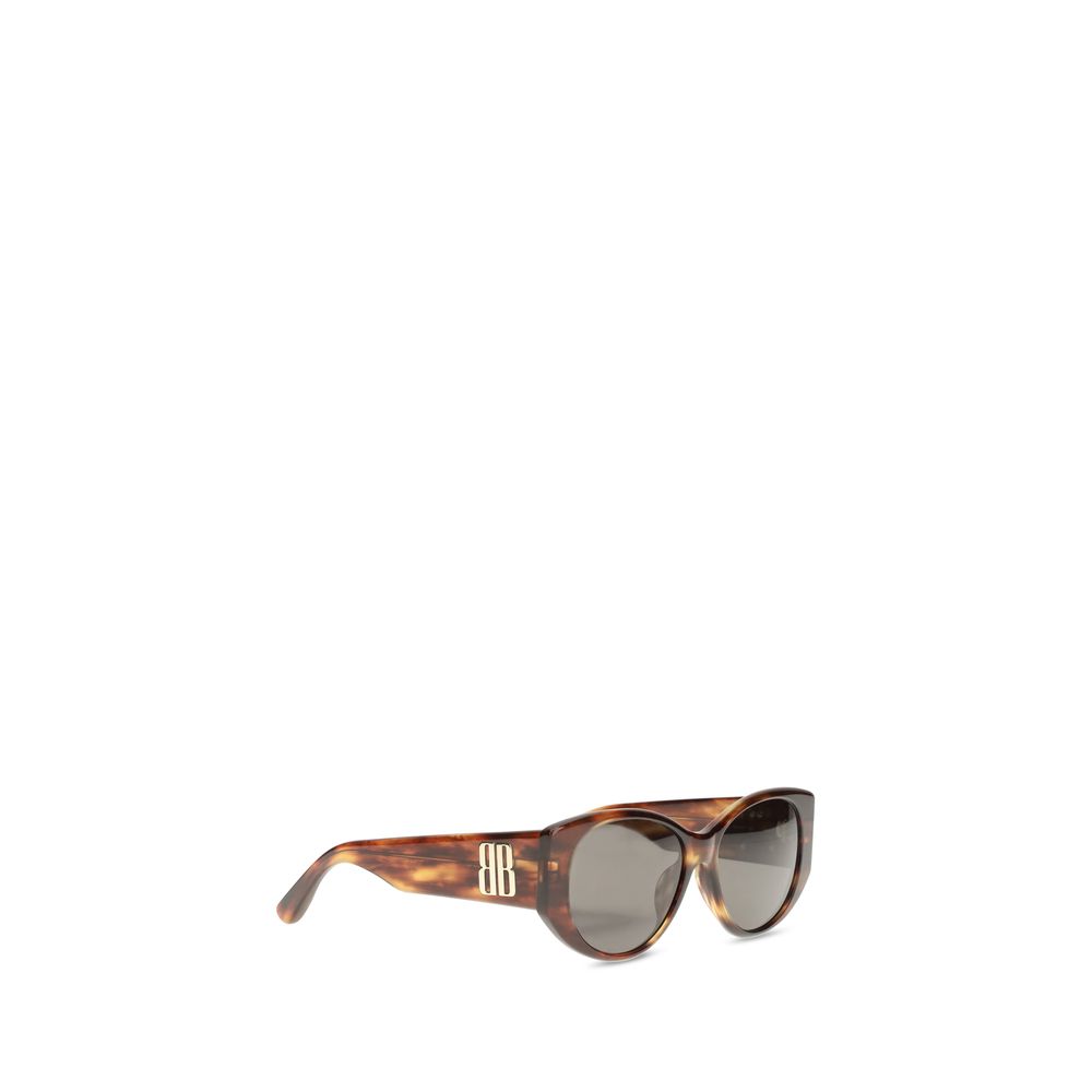Tortoiseshell cat-eye sunglasses with dark lenses and BB logo on temples