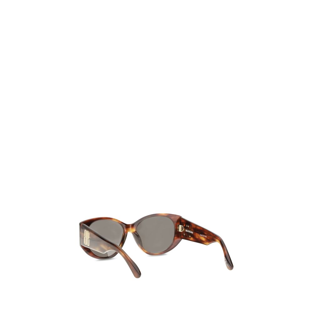 Balenciaga tortoiseshell oval sunglasses with dark lenses and branded temples